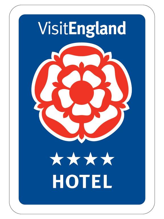 a blue sign with the vietnameland hotel logo at The Randolph Hotel in Southwold