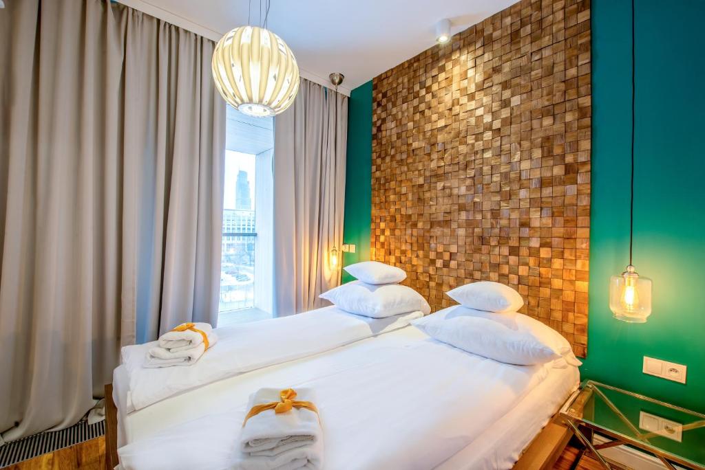 ワルシャワにあるゴー アパートメンツの緑の壁の部屋(ベッド2台付)