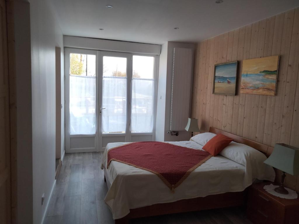 Posteľ alebo postele v izbe v ubytovaní Gîte du Bachat
