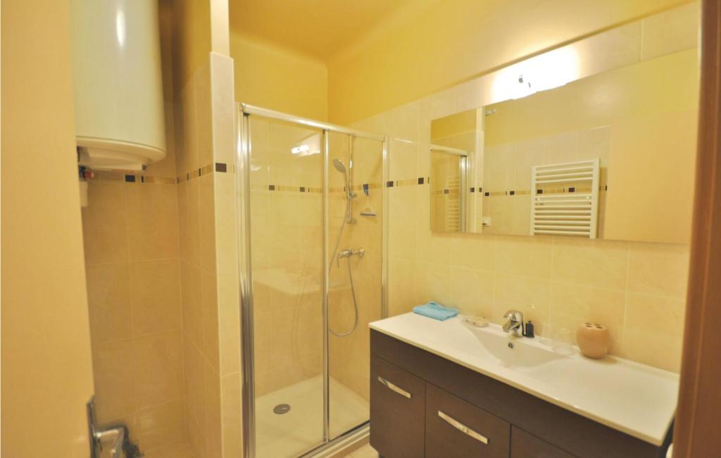 a bathroom with a shower and a sink and a shower at 1 Bedroom Awesome Apartment In Le Cannet in Le Cannet