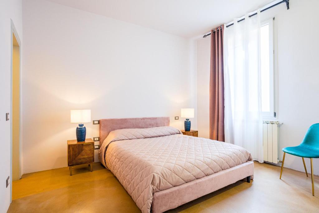 A bed or beds in a room at Condotta 16 Apartments