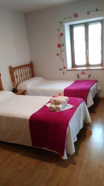Postel nebo postele na pokoji v ubytování Posada de Oitz