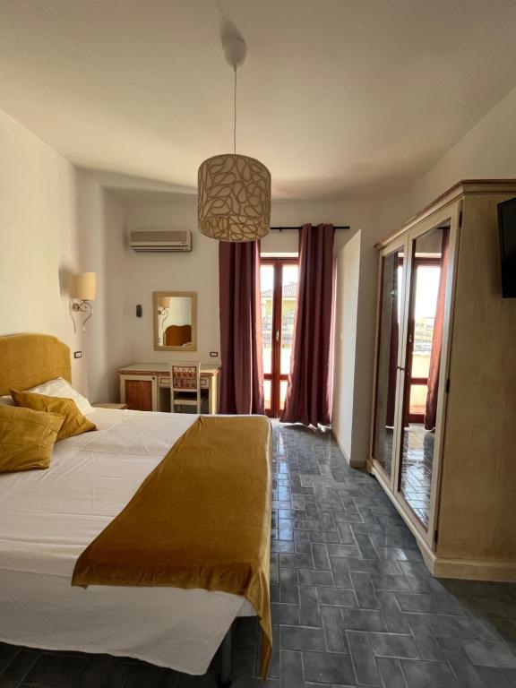 Postel nebo postele na pokoji v ubytování TC HOTEL