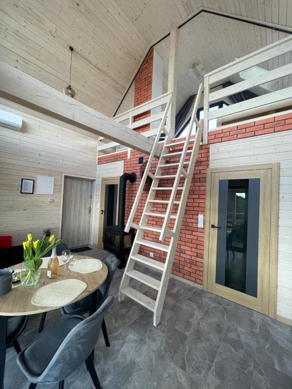Fotografie z fotogalerie ubytování Osada Skoczkowo komfortowe domki z jacuzzi nad jeziorem- sauna- balia- prywatny staw wędkarski v destinaci Podiazy