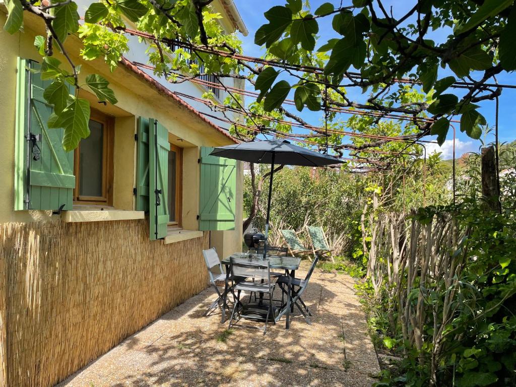 Vonkajšia záhrada v ubytovaní Appartement avec jardin privatif