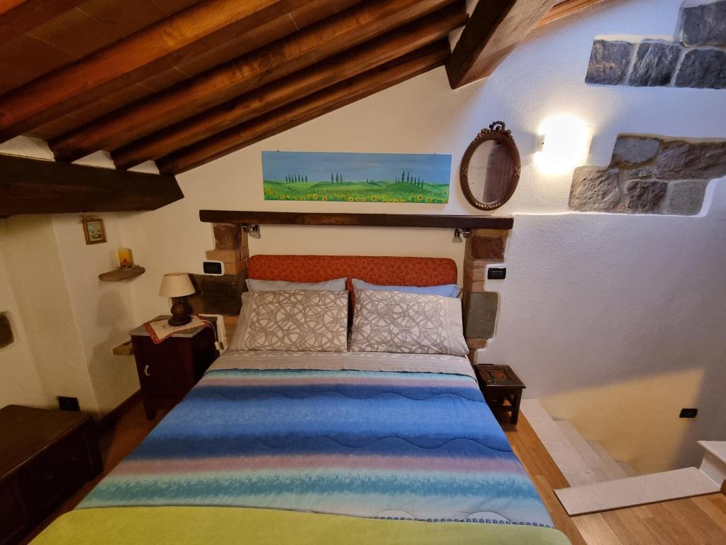 Postel nebo postele na pokoji v ubytování Casetta Giulia