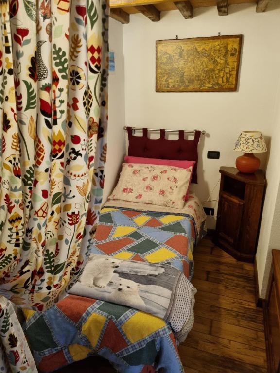 Postel nebo postele na pokoji v ubytování Casetta Giulia