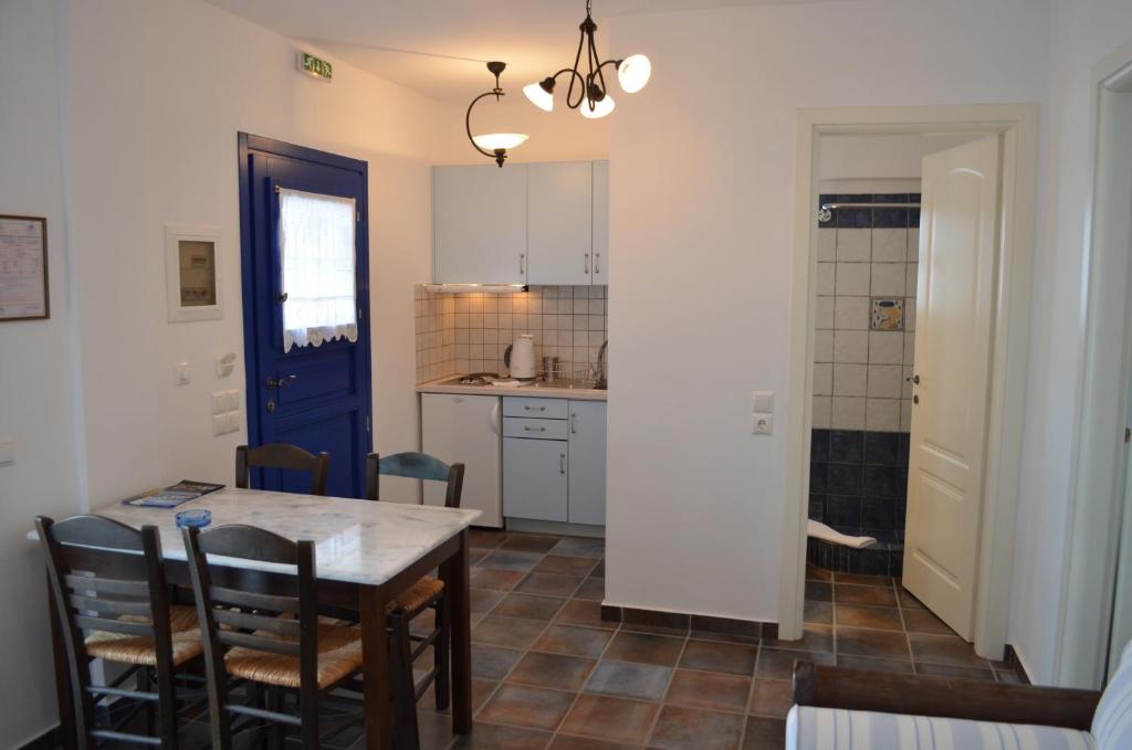 Kuchyň nebo kuchyňský kout v ubytování Maryianni Apartments