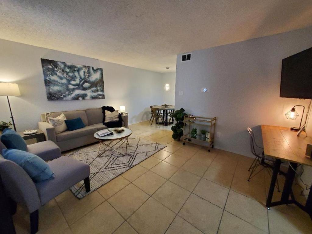 a living room with a couch and a table at Condo Near Downtown Austin - 2br in Austin