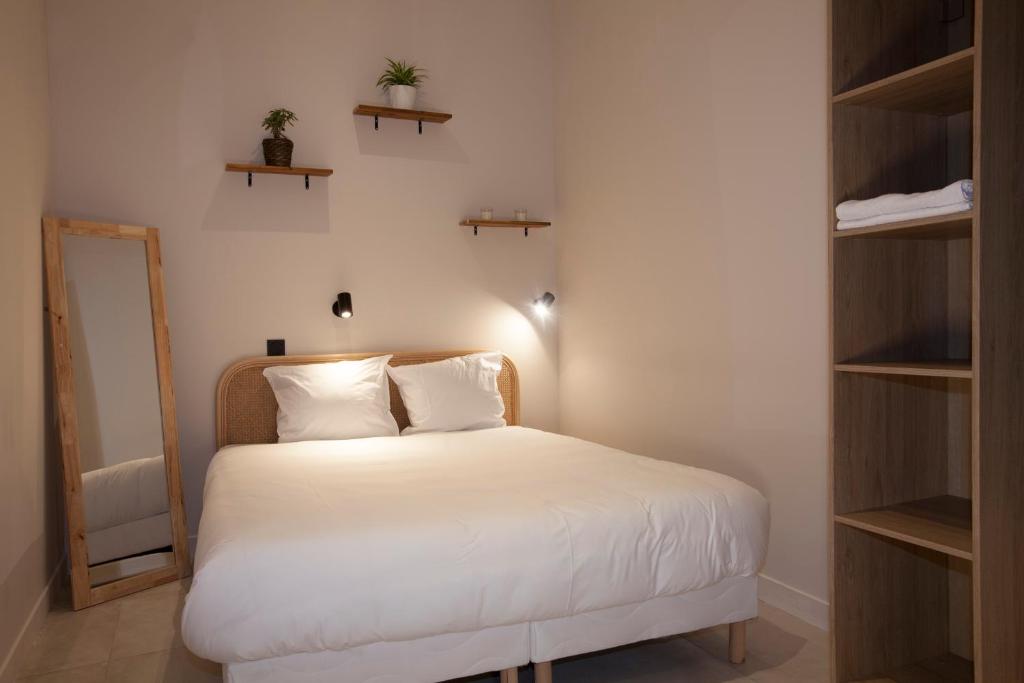 Postel nebo postele na pokoji v ubytování Le Maje Hostel