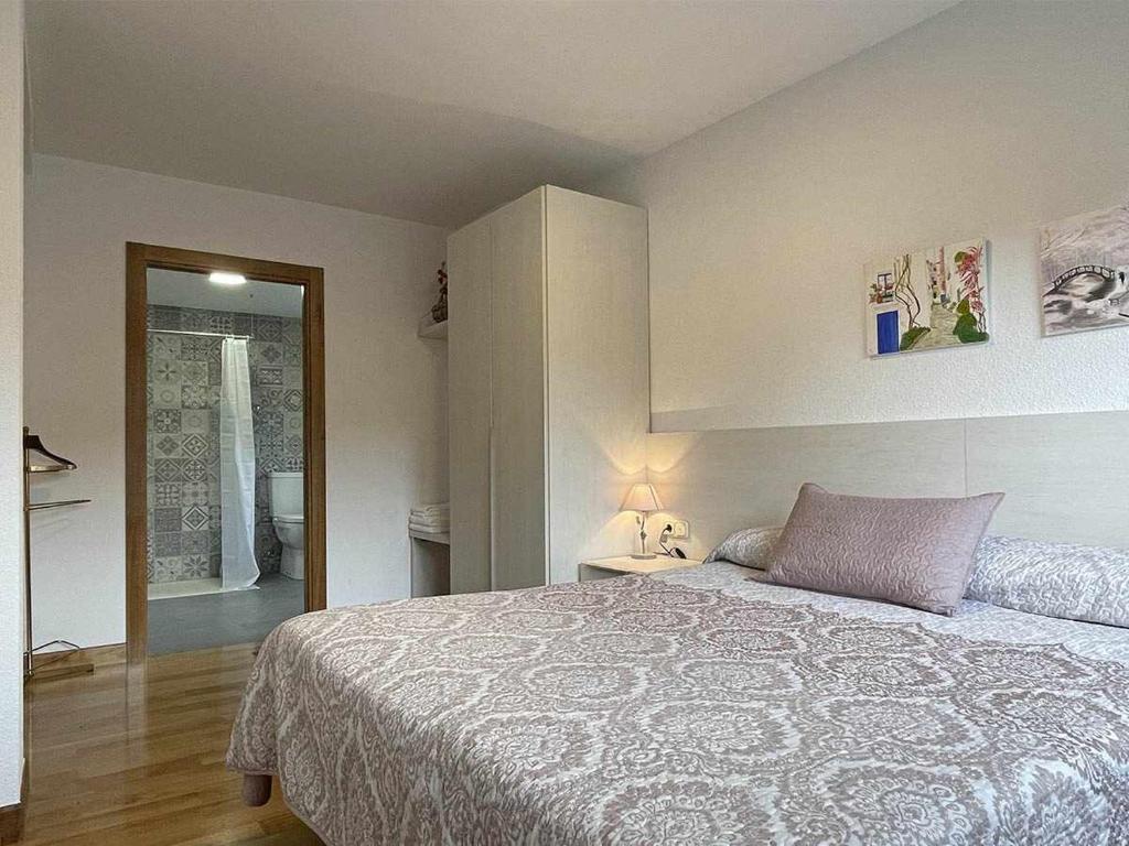 Postel nebo postele na pokoji v ubytování Casa Jabarde