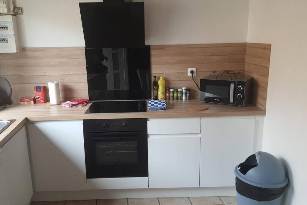 Kuchyňa alebo kuchynka v ubytovaní Radepont Maison 8 pers. max