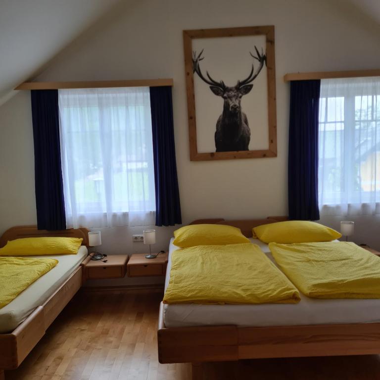 Postel nebo postele na pokoji v ubytování Ferienhaus Pepi