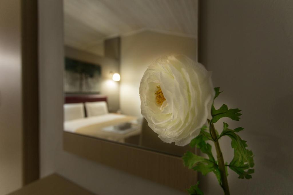 Postel nebo postele na pokoji v ubytování Zefyros Sea View Hotel