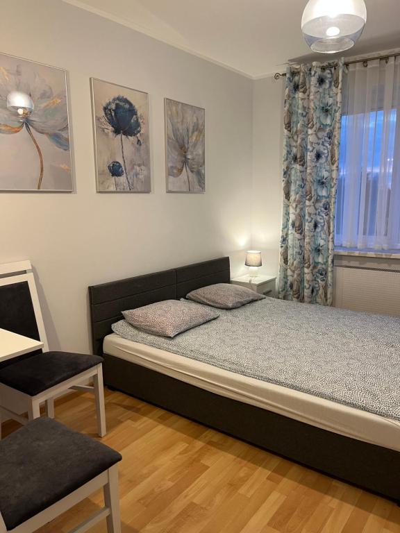 Posteľ alebo postele v izbe v ubytovaní Pokoje u Asi