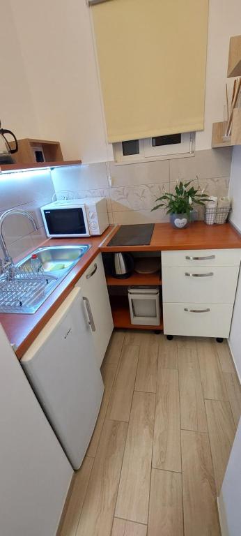 Kuchyň nebo kuchyňský kout v ubytování Guest House Krk Town Centre
