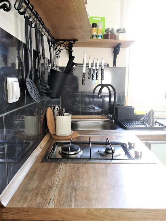 Kuchyň nebo kuchyňský kout v ubytování Apartmaji Prton Bovec