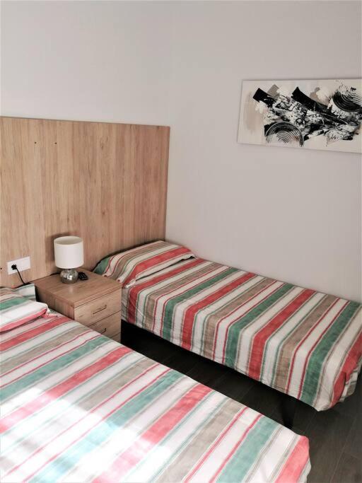 Posteľ alebo postele v izbe v ubytovaní Apartamento céntrico en Palamós