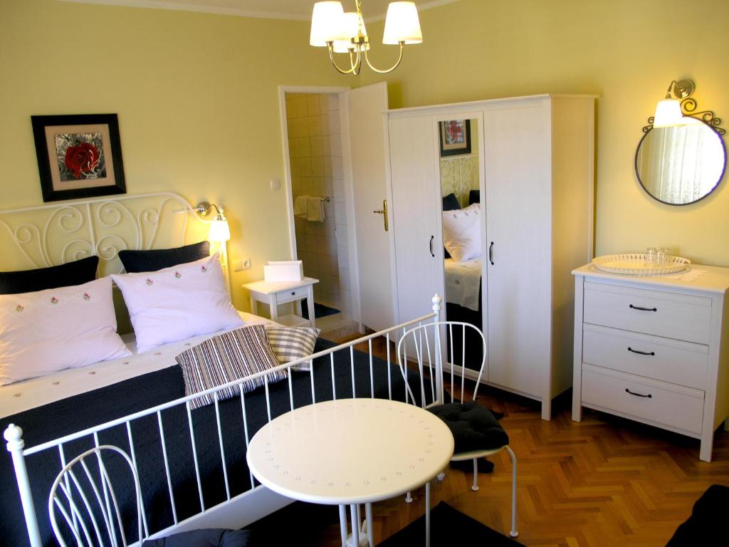 Postel nebo postele na pokoji v ubytování House Rozi