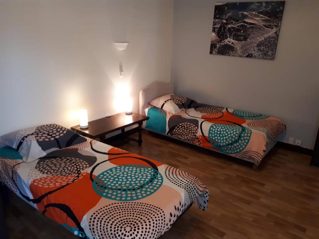 Postel nebo postele na pokoji v ubytování Maison de vacances familiale