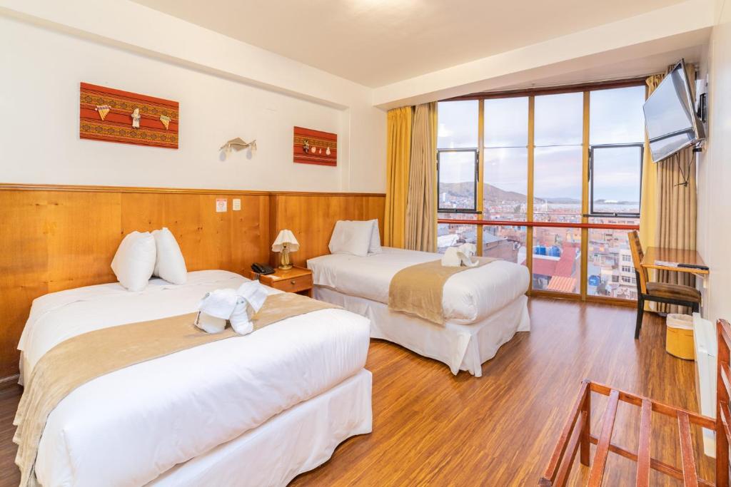 Кровать или кровати в номере Hotel Qalasaya