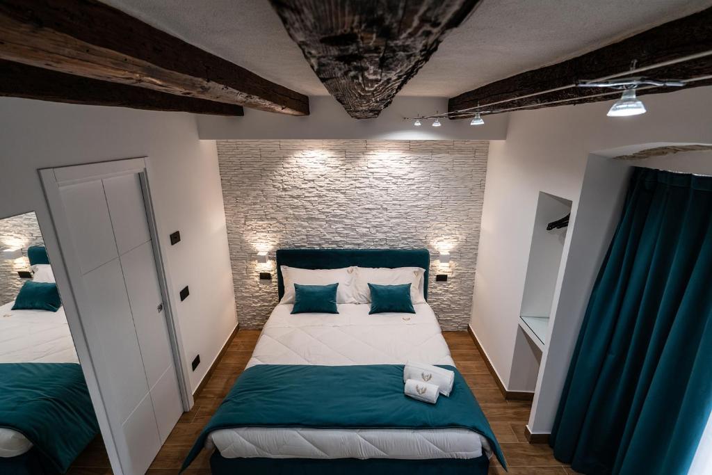 Postel nebo postele na pokoji v ubytování Sofi' Center Rooms