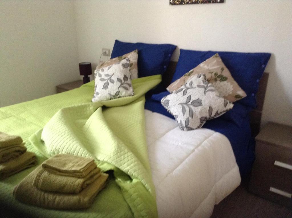 Postel nebo postele na pokoji v ubytování B&B Luce Viola