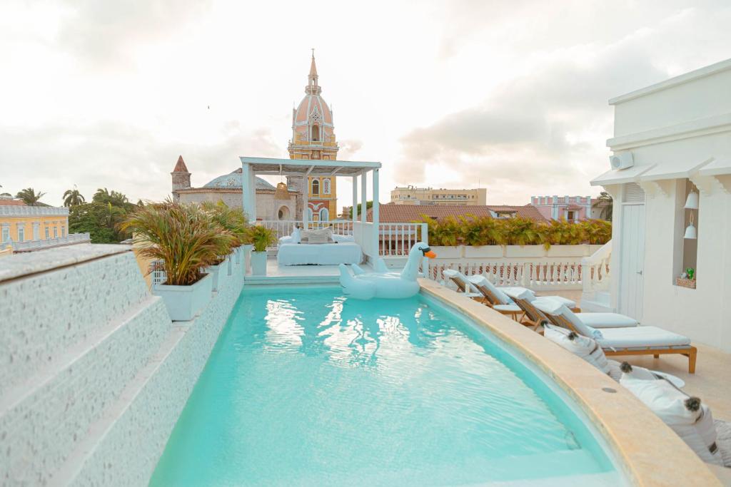 a swimming pool on the roof of a building at Casa Diluca Cartagena Hotel Boutique in Cartagena de Indias