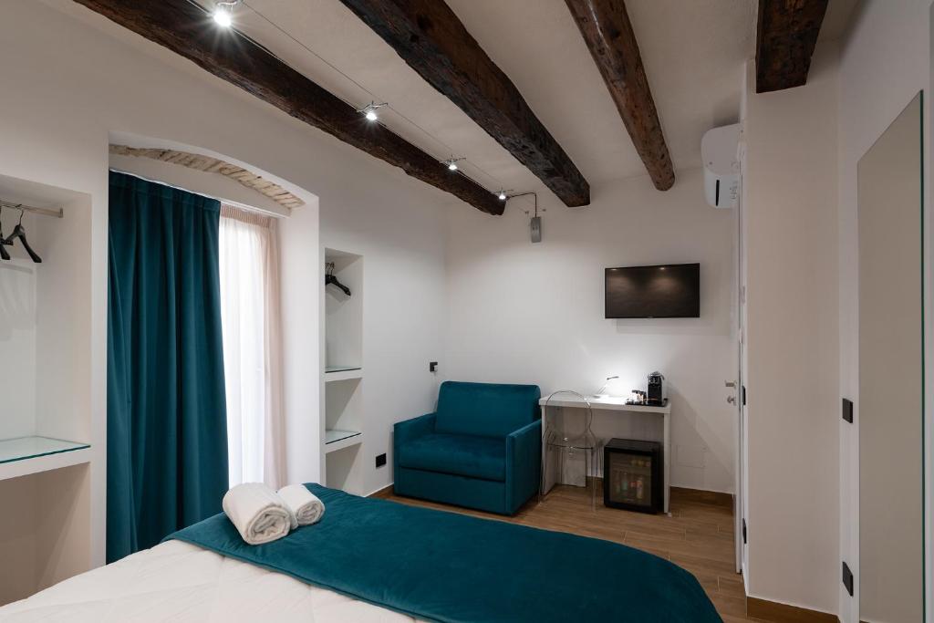 Postel nebo postele na pokoji v ubytování Sofi' Center Rooms