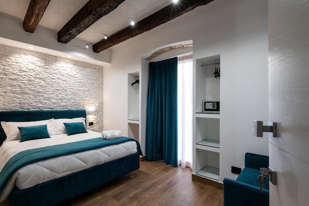 Postel nebo postele na pokoji v ubytování Sofi' Center Rooms