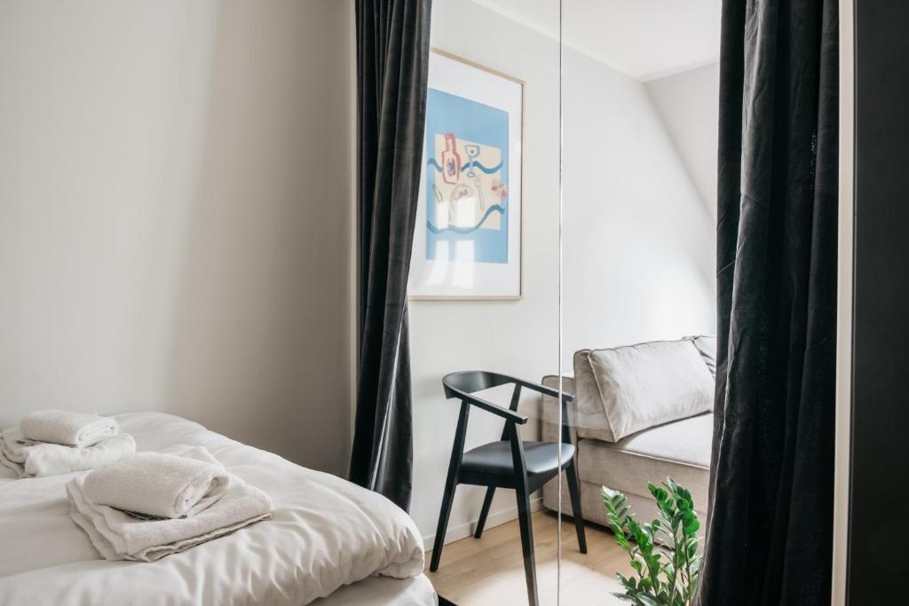 Postel nebo postele na pokoji v ubytování Stay l Fløyen