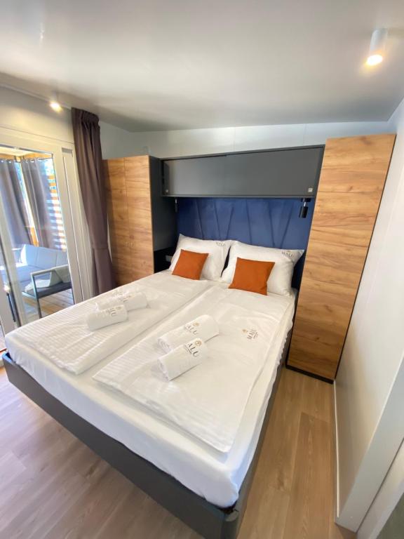 Postel nebo postele na pokoji v ubytování Mobile Homes MaLu