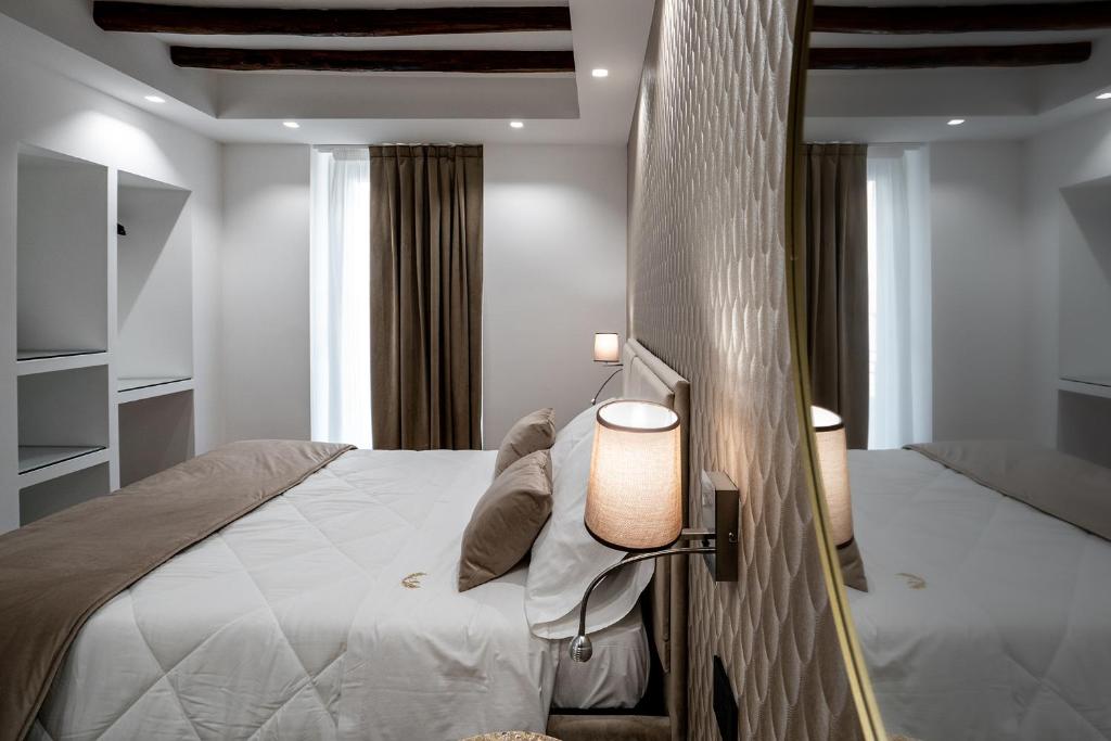 Postel nebo postele na pokoji v ubytování Sofi' Center Rooms