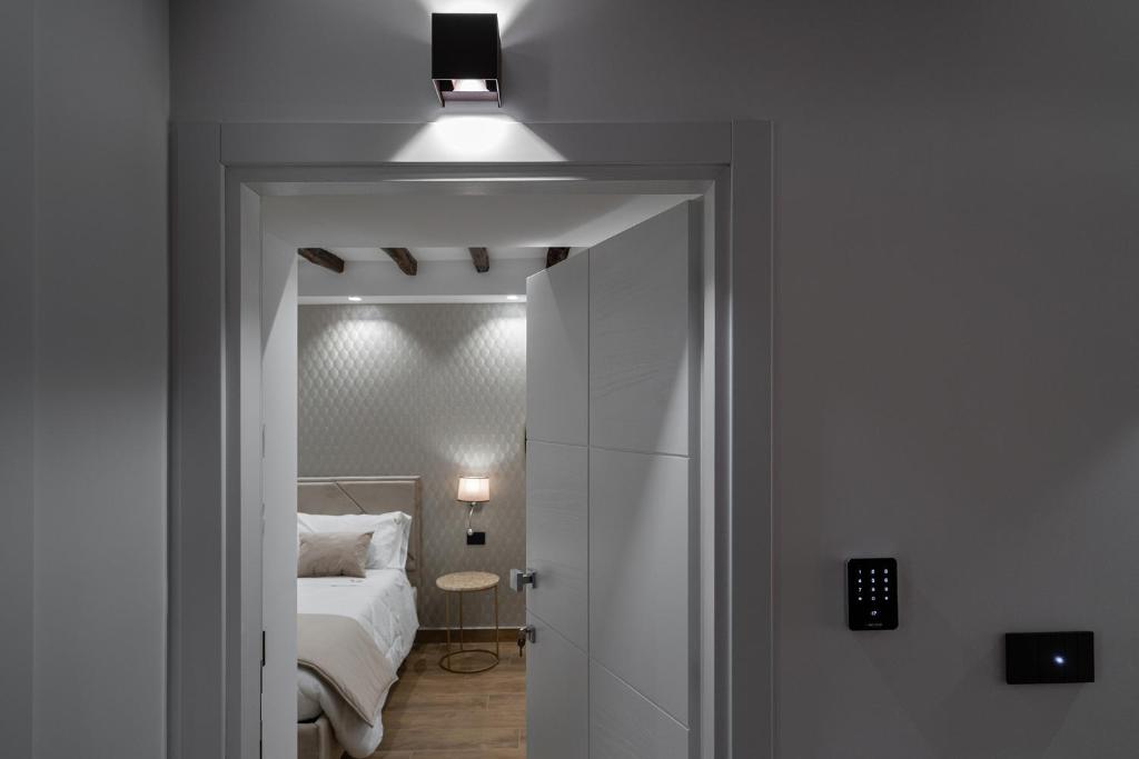 Postel nebo postele na pokoji v ubytování Sofi' Center Rooms