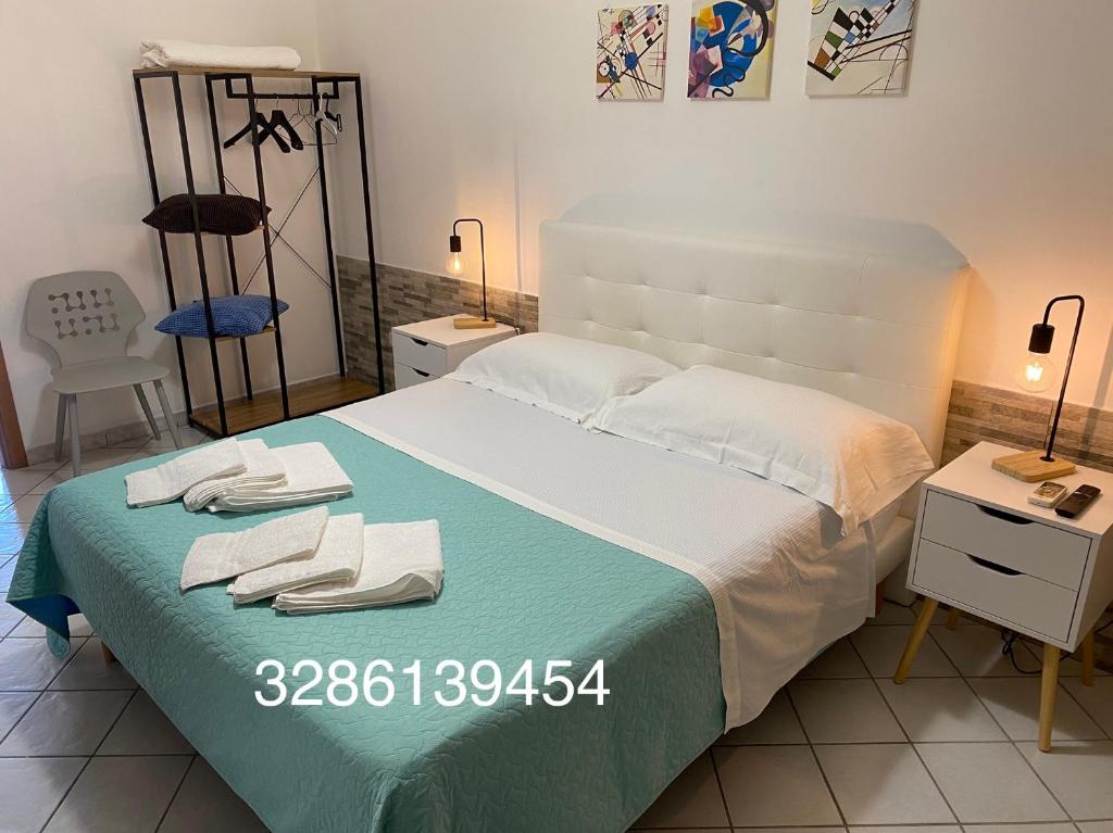 Casa vacanza Scala dei Turchi tesisinde bir odada yatak veya yataklar