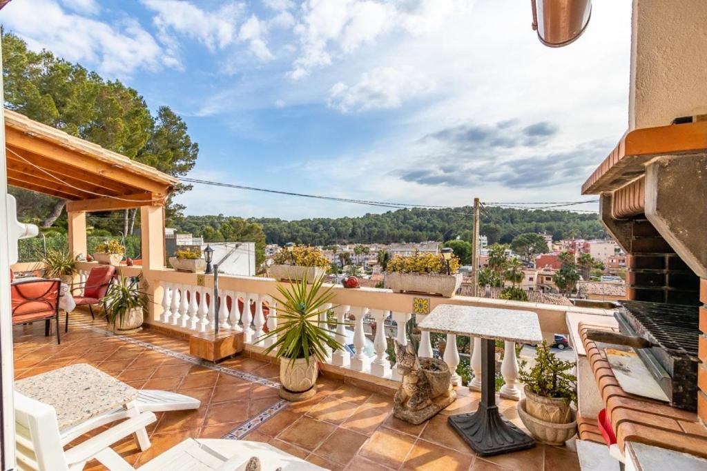 a balcony with a view of a city at Villa Joana in Palma de Mallorca