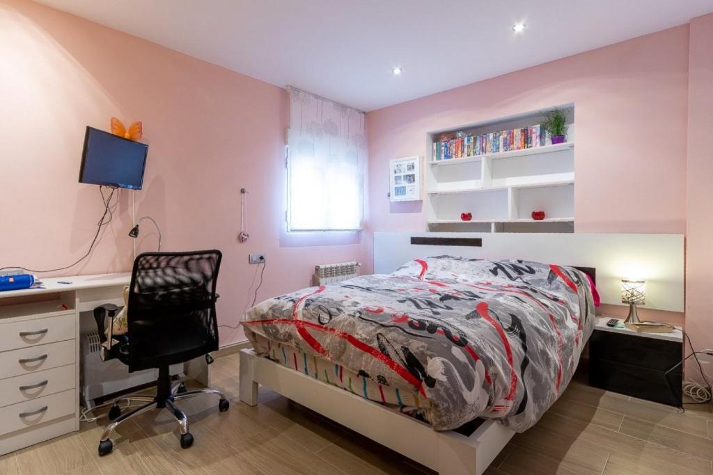 Postel nebo postele na pokoji v ubytování Villa Joana