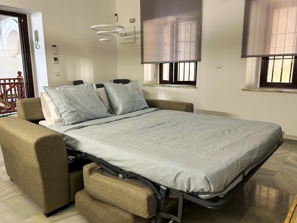 Posteľ alebo postele v izbe v ubytovaní Apartamento Centro Cabildo Antiguo Convento