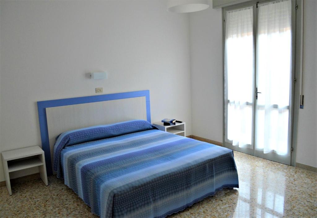 Postel nebo postele na pokoji v ubytování Hotel Canoa