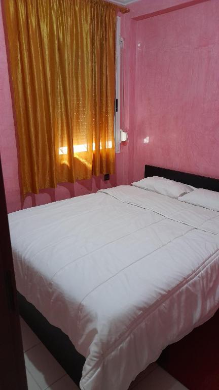 Postel nebo postele na pokoji v ubytování Appartement Stade Tanger