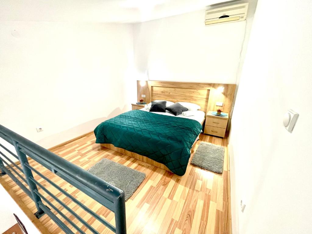 Postel nebo postele na pokoji v ubytování Guest House-MD