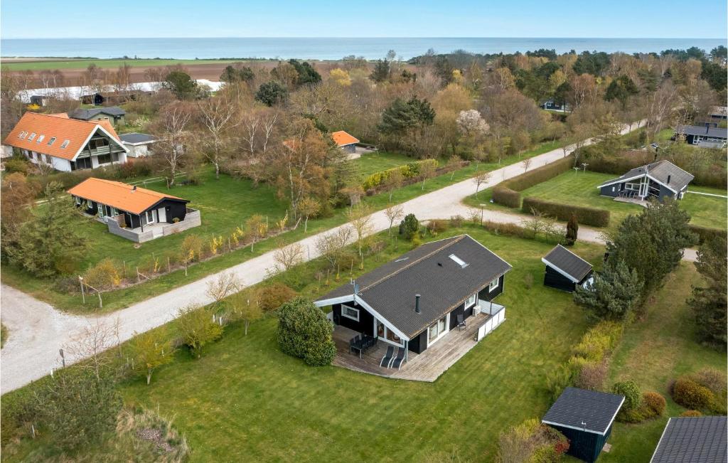 an overhead view of a house with a yard at 3 Bedroom Nice Home In Sams in Nordby