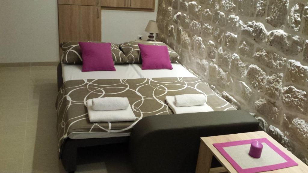 Posteľ alebo postele v izbe v ubytovaní Studio Apartment Legcevic