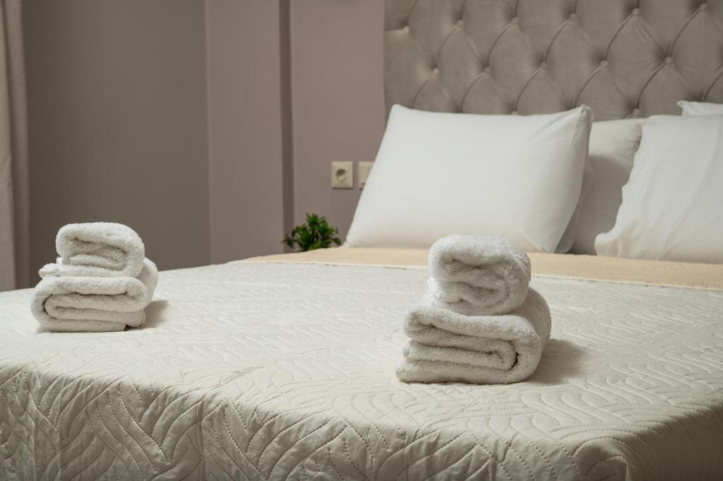 Posteľ alebo postele v izbe v ubytovaní Procris Villas Breathtaking Sea View
