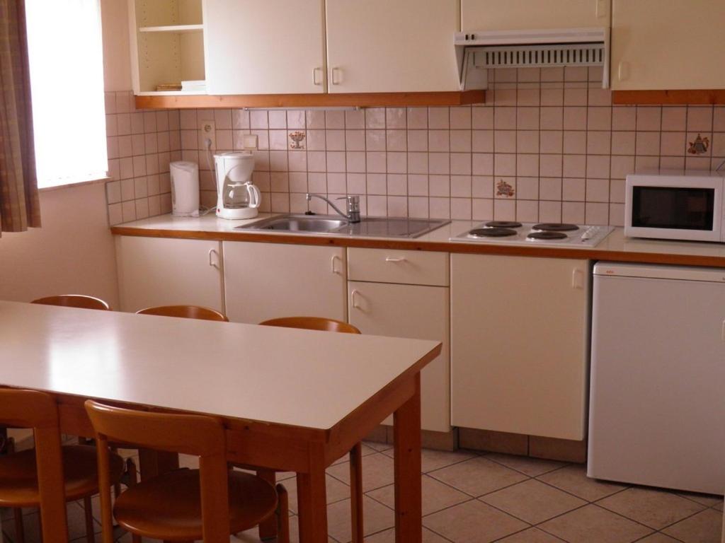 Kuchyň nebo kuchyňský kout v ubytování Domein Westhoek Apartment
