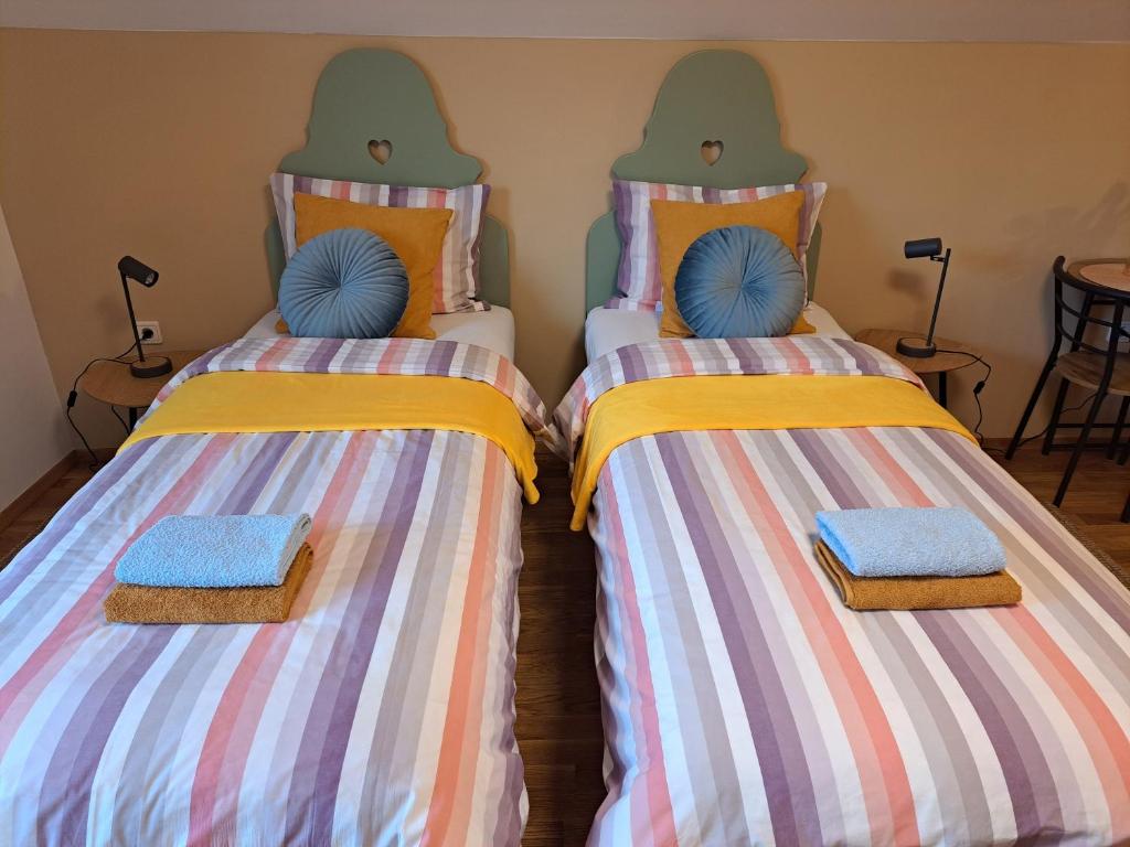 Postel nebo postele na pokoji v ubytování Room Art&deco