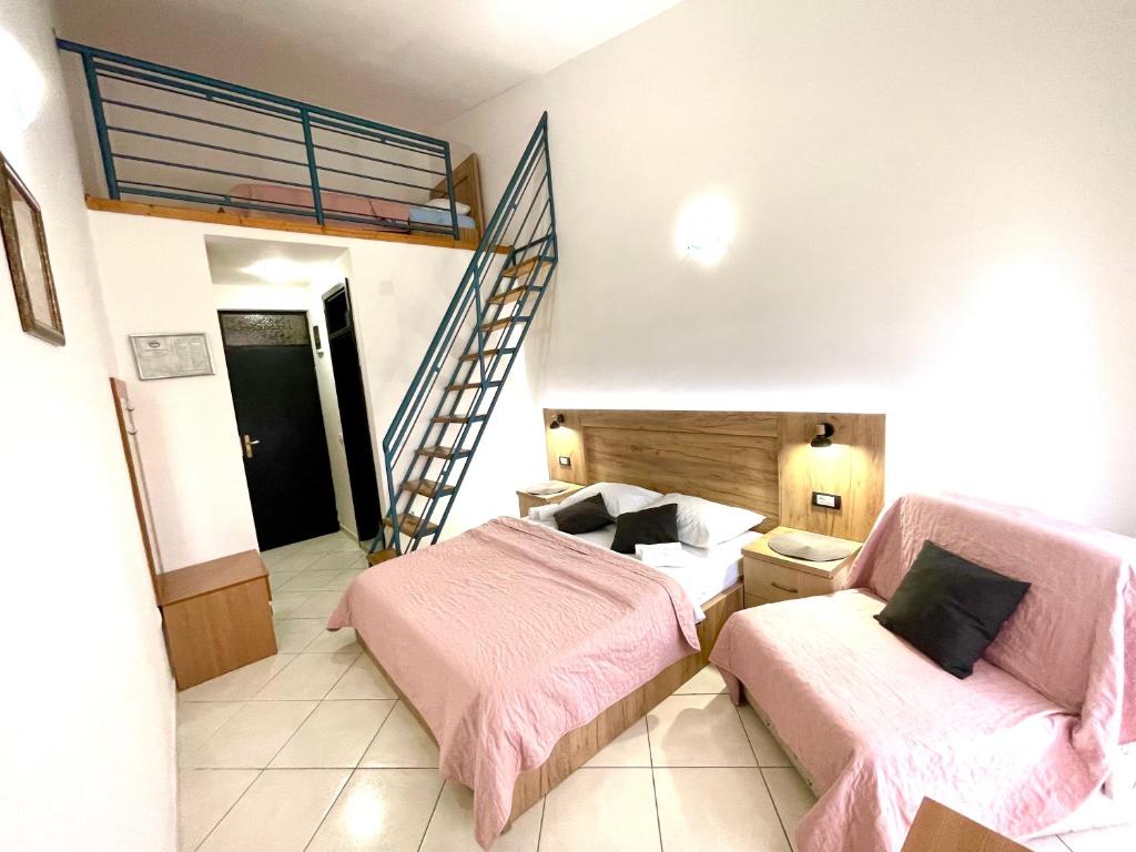 Postel nebo postele na pokoji v ubytování Guest House-MD