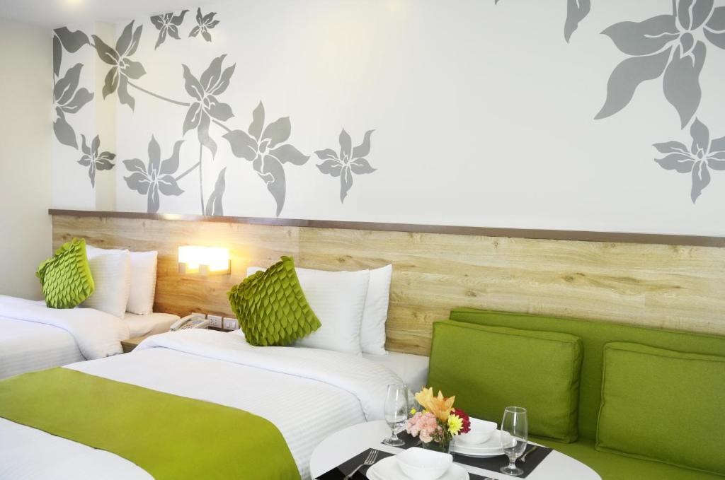 Postel nebo postele na pokoji v ubytování Azalea Hotels & Residences Boracay