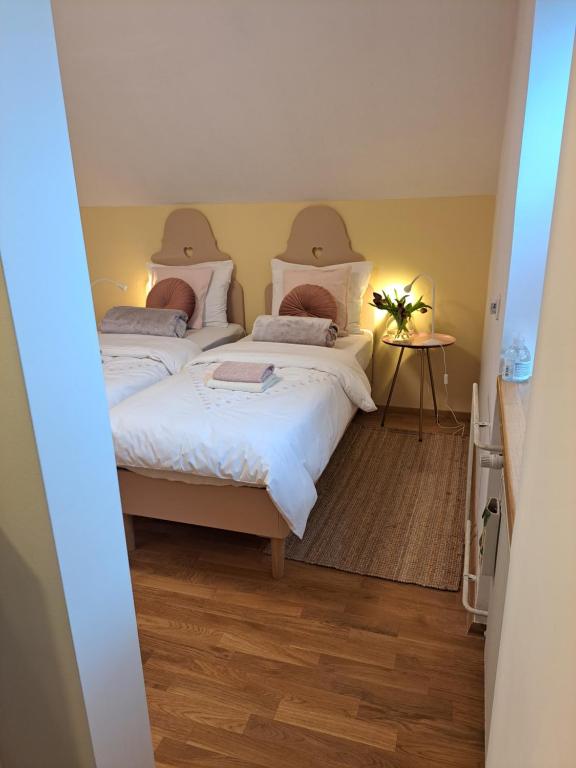Postel nebo postele na pokoji v ubytování Room Art&deco