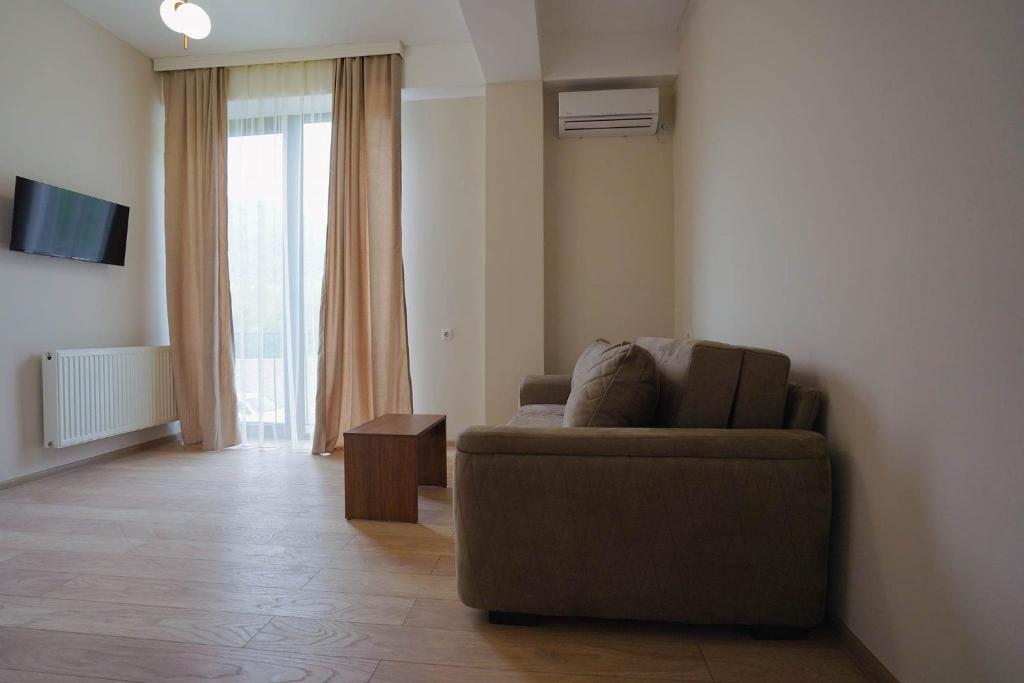 TV a/nebo společenská místnost v ubytování Tilia Kvareli Resort